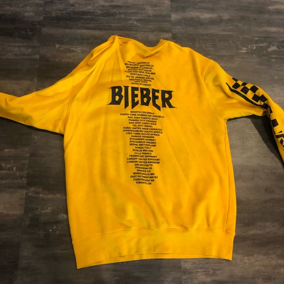 purpose tour yellow sweater